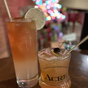 two cocktails on a table