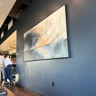 two people standing in a restaurant