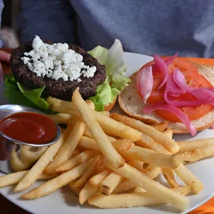 a burger and fries on a plate
