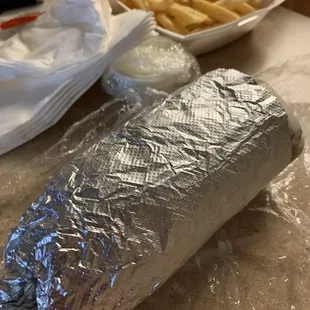 Gyro pita, side of fries with an extra side of tzatziki sauce and tons of napkins!