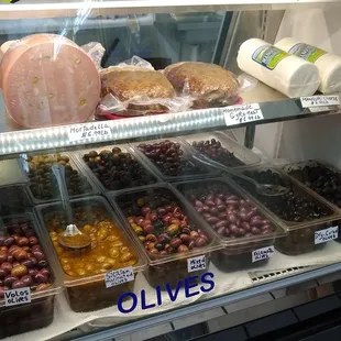 a variety of foods in a display case