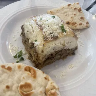Moussaka with Small Caesar Salad & Pita Bread