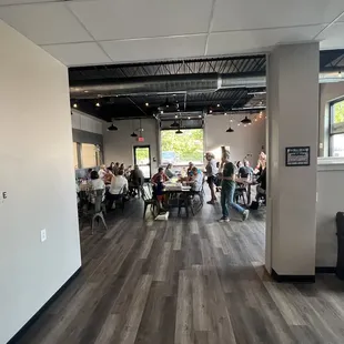 a group of people sitting at tables