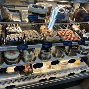 a display of cakes and pastries