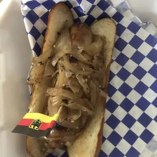 Bratwurst w/ sautéed onions on pretzel. Daughter loved it!