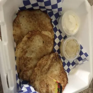 3 potato pancakes w/ sides of sour cream &amp; apple sauce for dipping.