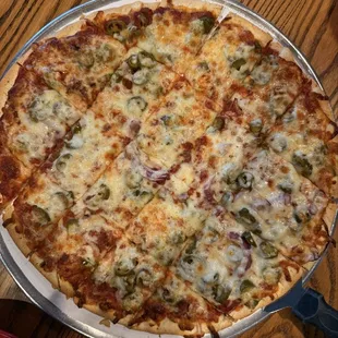 Thin crust. Jalepenos and onions