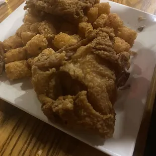 Chicken dinner with all white meat and tater tots instead of broasted potatoes.