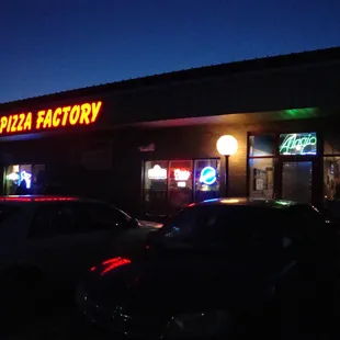 Main sign and entry door, view looking southwest.