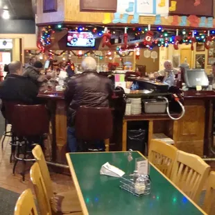 Bar and left (south) seating area, view from the front entry..