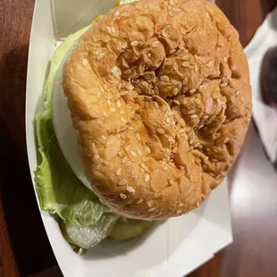 a sandwich in a paper container