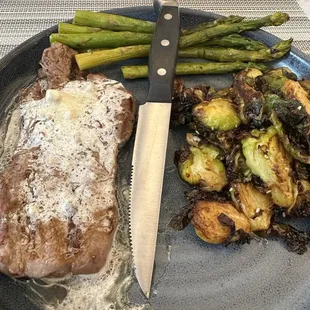 NY Strip with crispy brussels and grilled asparagus