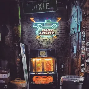 a neon sign and a slot machine