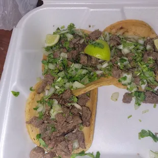 Carne asada tacos .  Yummy   I ate one. Lol