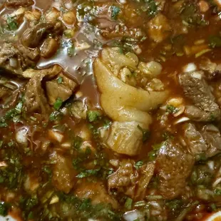 Menudo (tripe, pigs feet, hominy)