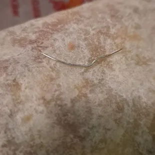 a burrito wrapped in paper