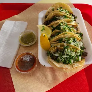 Asada mini Taco Tuesday deal $1 each.  Delicious. Reminds me of Ensenada.