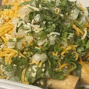 Rolled tacos - Chicken ( asked for cilantro and onions on top and that they be fried soft )
