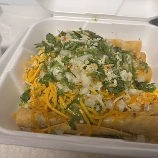 Rolled tacos - Chicken ( asked for cilantro and onions on top and that they be fried soft )