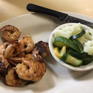 I got the Grilled Shrimp Dinner with two sides . Its was very good !