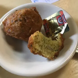 I got 2 hushpuppies cause I heard they were good! The waitress said some fresh ones are coming out &amp; she would get me some .