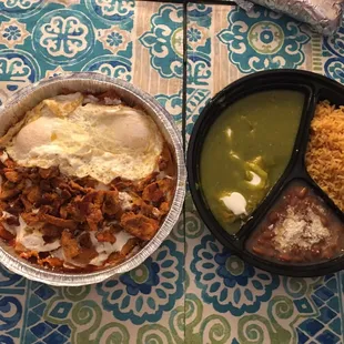 Our takeout. On the left chilaquiles  On the right: huevos rancheros with salsa verde  YUM!