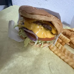 Double cheeseburger  freshly made fresh onions and lettuce