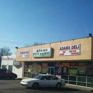 a car parked in front of the store