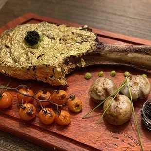 a wooden cutting board with a variety of food items
