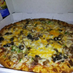 Deluxe pizza with Italian sausage &amp; cheddar!