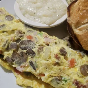 Omelet grits and croissant