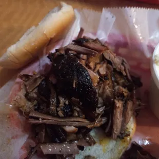 Brisket Sandwich with "bark" with sauce on the side.  Double order of slaw (VERY good slaw).