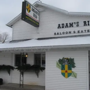 Across the street from the pond.  Best bar in town by a damn site!