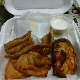 Seafood platter and loaded baked potato