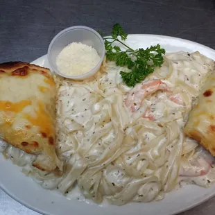 Shrimp Fettuccine served with cheesy garlic bread!  You can also get Chicken or just plain Fettuccine!