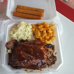 Triple meat platter. NC BBQ, brisket, ribs, potato salad and spicy Mac and cheese