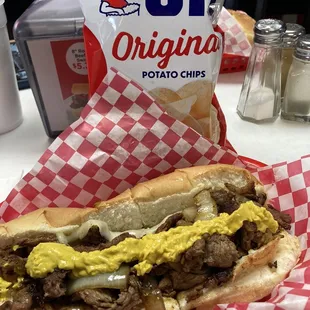 Steak and onions with provolone.  Add mustard and the right bag of chips.