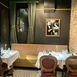 a dining room with tables and chairs