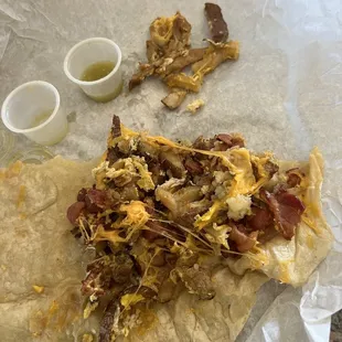 a burrito with meat and cheese