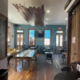 tables and chairs in a coffee shop