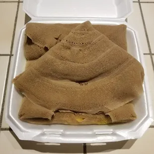 Veggie dish combo... injera on top