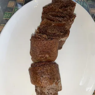 Kategna: Ethiopian spices butter mixed with berbere and rolled in crispy injera