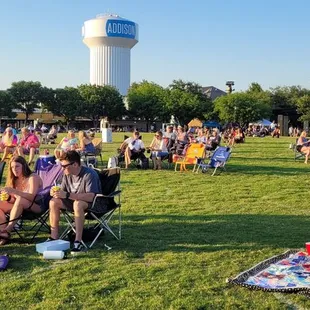 The socially distanced crowd enjoying Silent Rumor Band in Addison Circle Park.  This is the 70s Night Out concert with rock &amp; disco.
