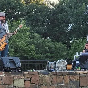 Silent Rumor Band playing 70s rock in the June event for Addison After Dark, in Addison Circle Park.
