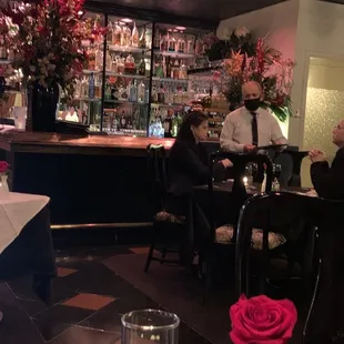 people sitting at the bar