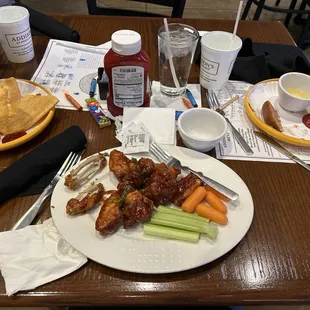 House BBQ wings, child's cheese quesadilla with smiley fries, child's corn dog with mandarin oranges.