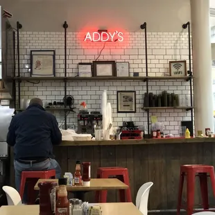 a man sitting at the counter