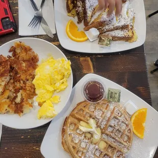 French toast, ( my kid would not wait to eat) Hashbrowns, scrambled eggs and a Belgium waffle.. All so good.