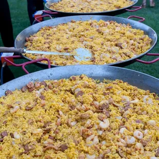 Paella line up at our wedding ready to feed the big crowd