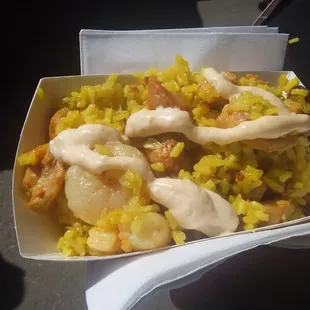 The paella was small for the price and some of the rice was not cooked.  It also had no flavor.  I love paella, but dissapointed